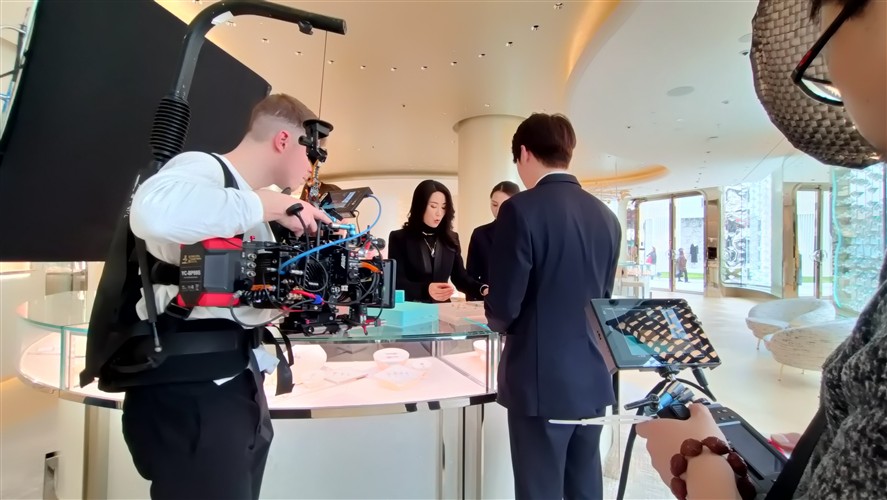 Chengdu crew members discussing a shoot plan